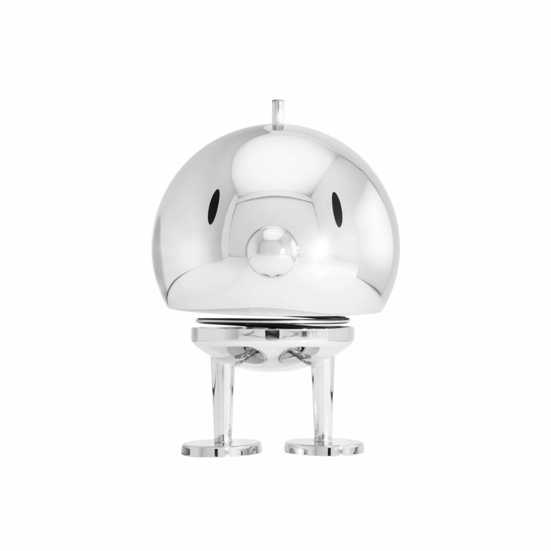 Silver metallic round figure  on a white background