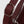 Silver Hardware and buckle on a mahogany leather bag strap