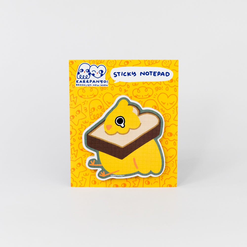 Sticky notepad with a cartoon character design on a yellow background