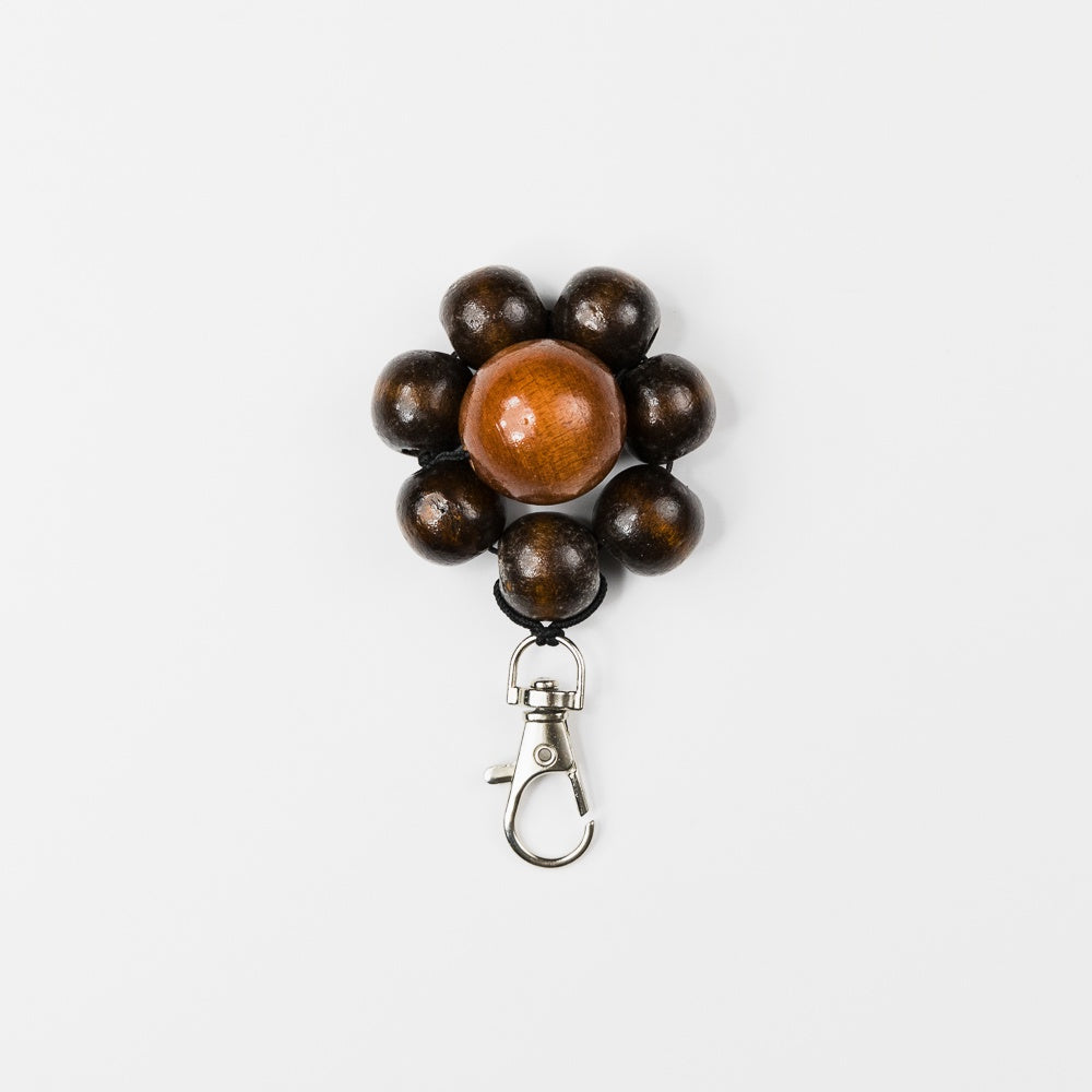 longan and tamarind brown flower keychain
