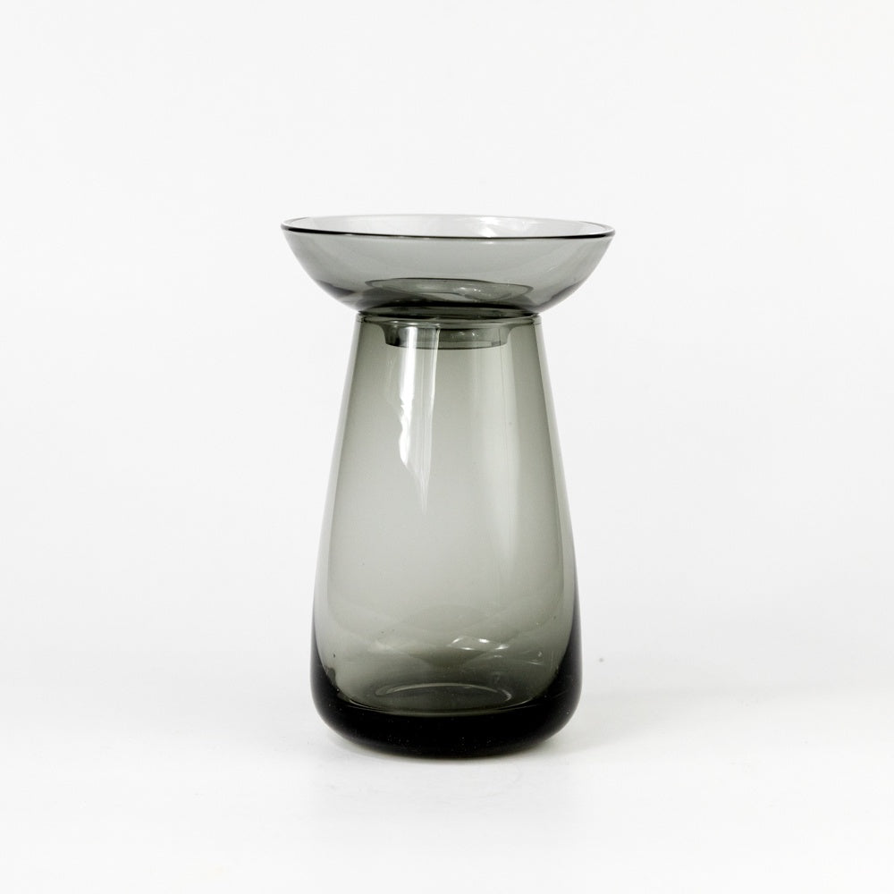 Smoky gray glass vase on a white background