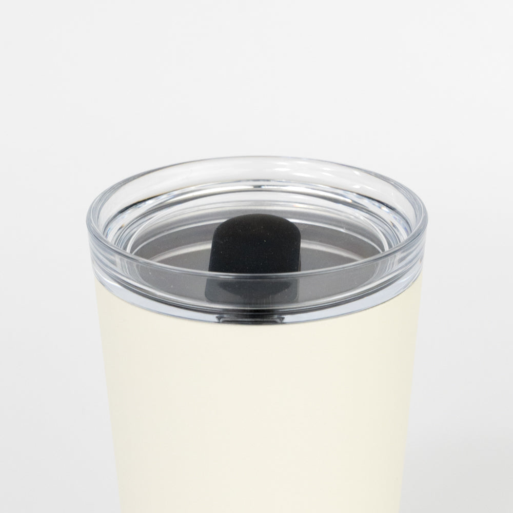 White tumbler with a clear lid on a white background, featuring the Kinto brand.