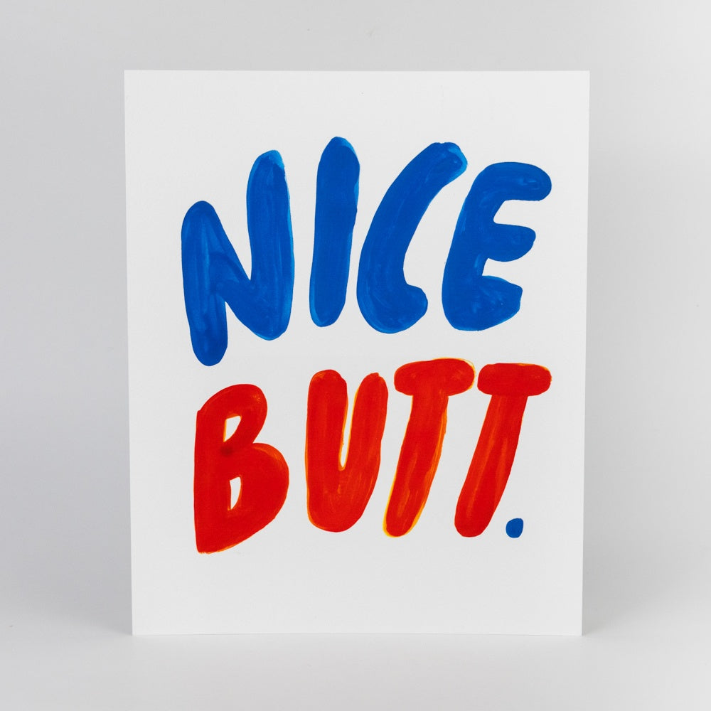Poster with 'NICE BUTT.' text in blue and red on a white background