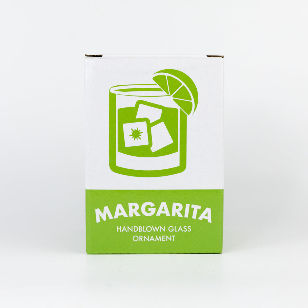 Box for a margarita-themed handblown glass ornament with lime graphic on a white background