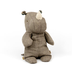 Textured toy rhino on a white background