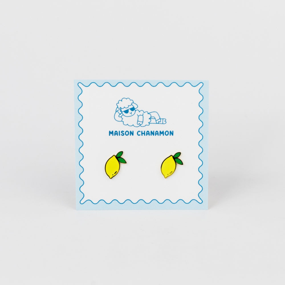 Lemon earrings on a card with 'Maison Chanamon' branding against a white background