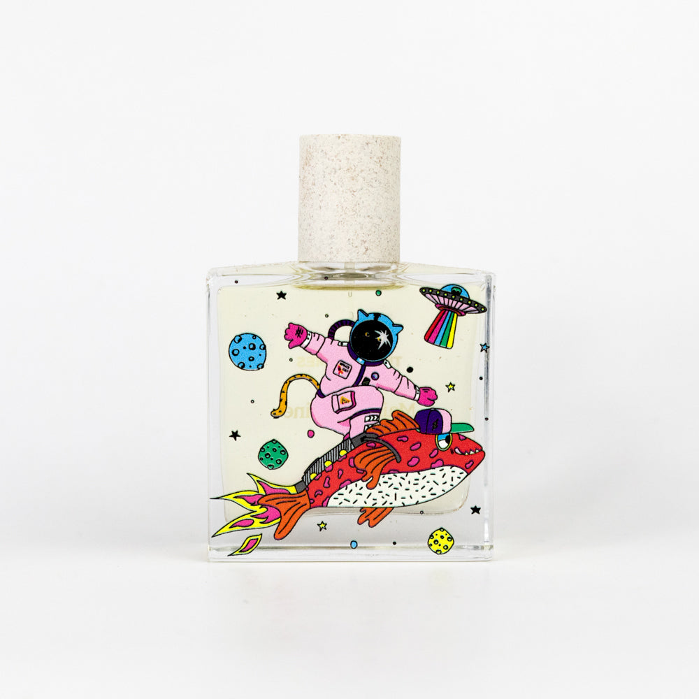 Perfume bottle with space-themed design on a white background
