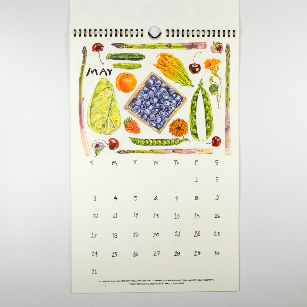 Calendar with illustrations of fruits and vegetables for May on a white background