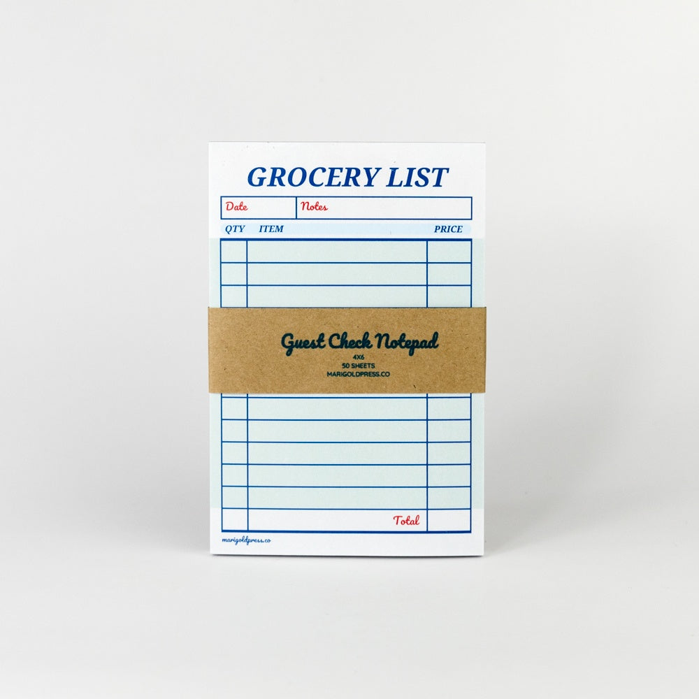 Notepad with a grocery list template designed to look like an old school restaurant bill on a white background