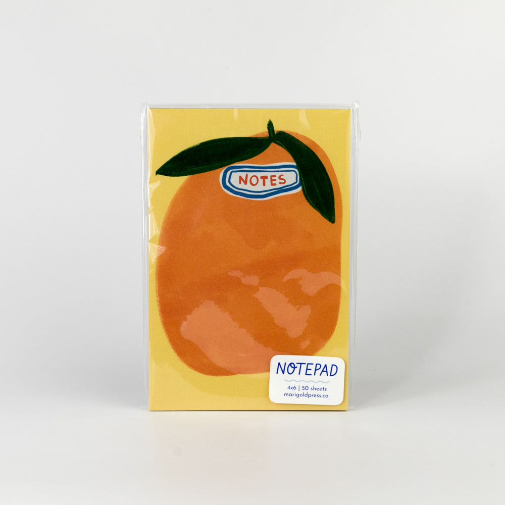 Notepad with an orange design on a white background