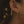 Close-up of an ear with a pair of elongated hoops