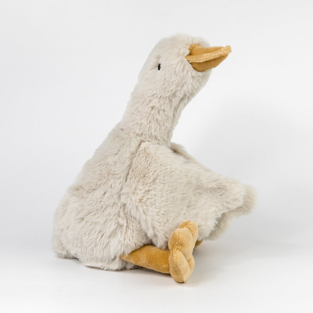 Plush toy goose on a white background
