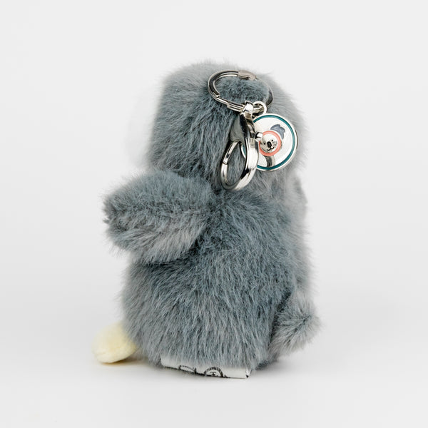 bag charm plush toy penguin on a white background