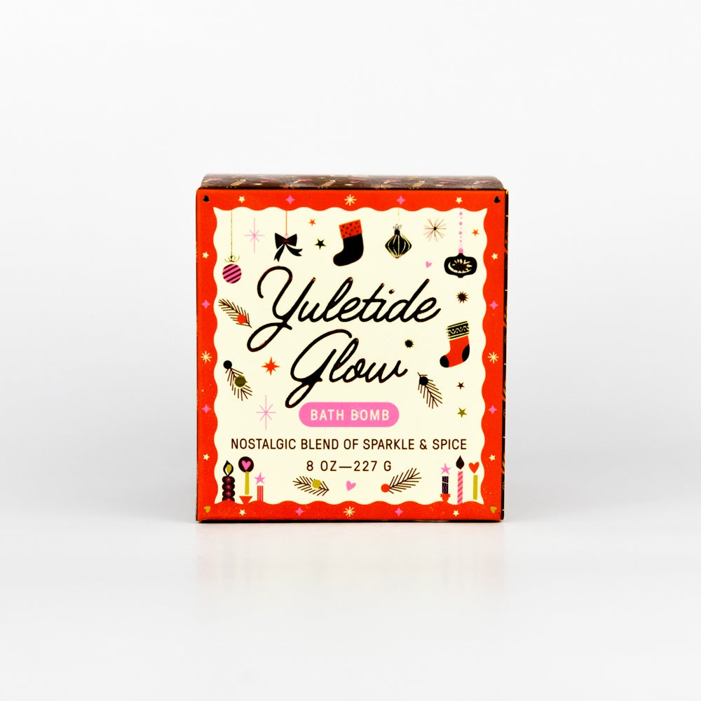 Yuletide Glow bath bomb packaging on a white background