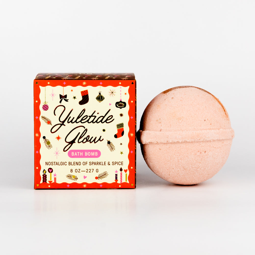 Yuletide Glow bath bomb packaging on a white background