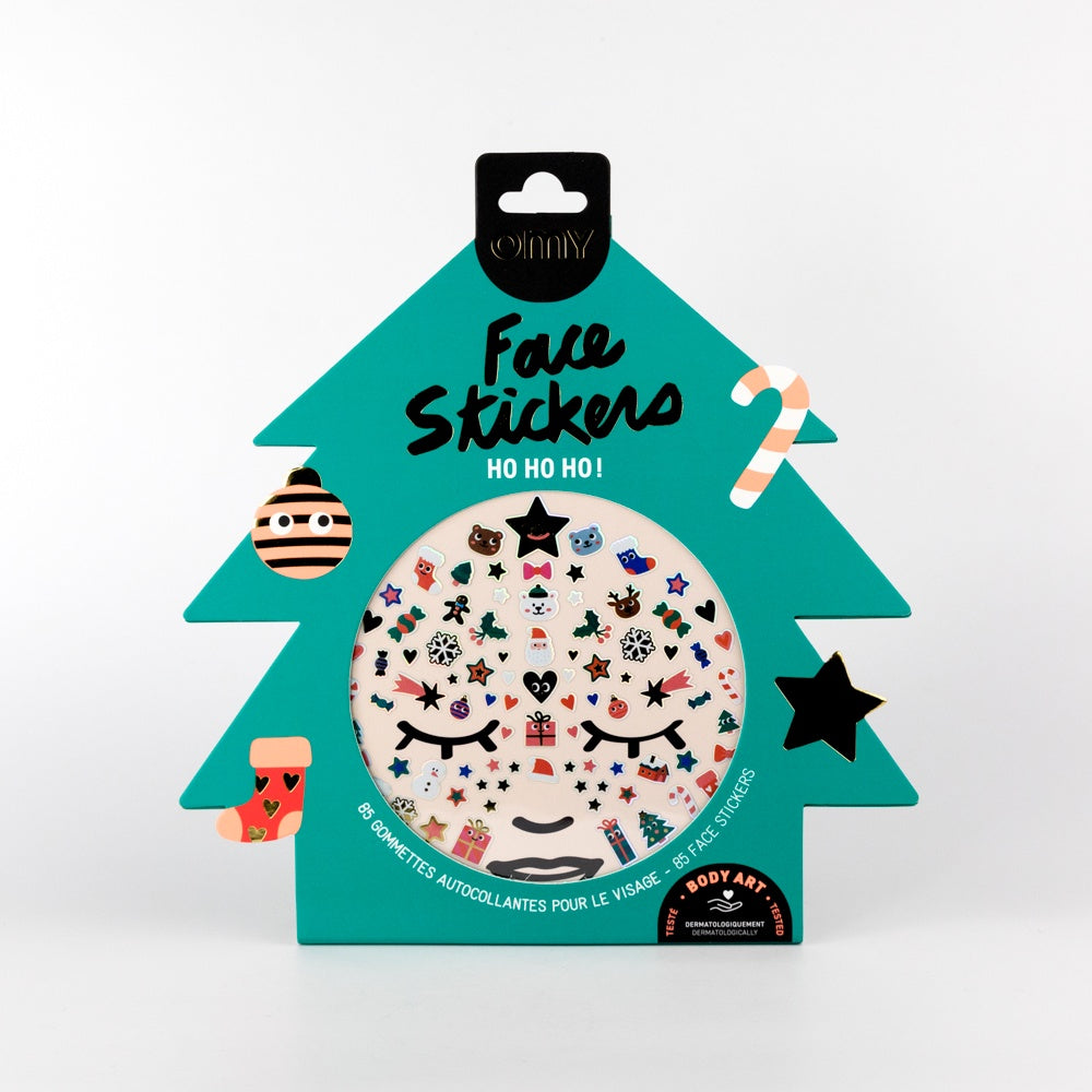 Packaged face stickers with a Christmas tree design on a white background