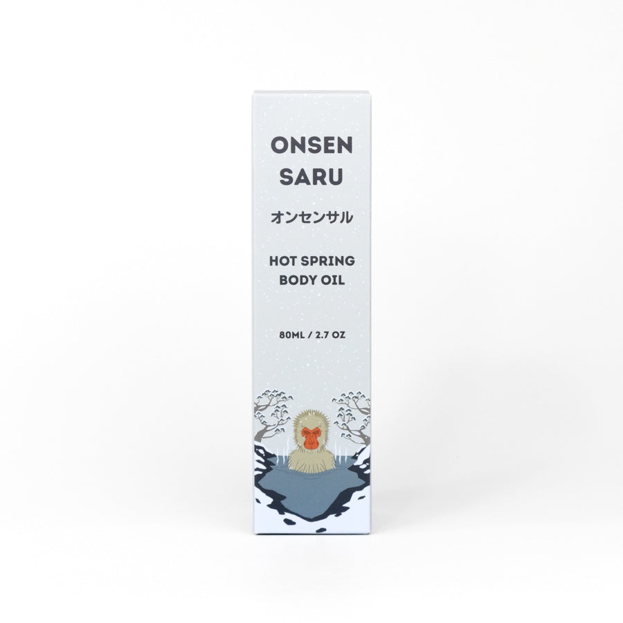 Onsen Saru hot spring body oil packaging on a white background