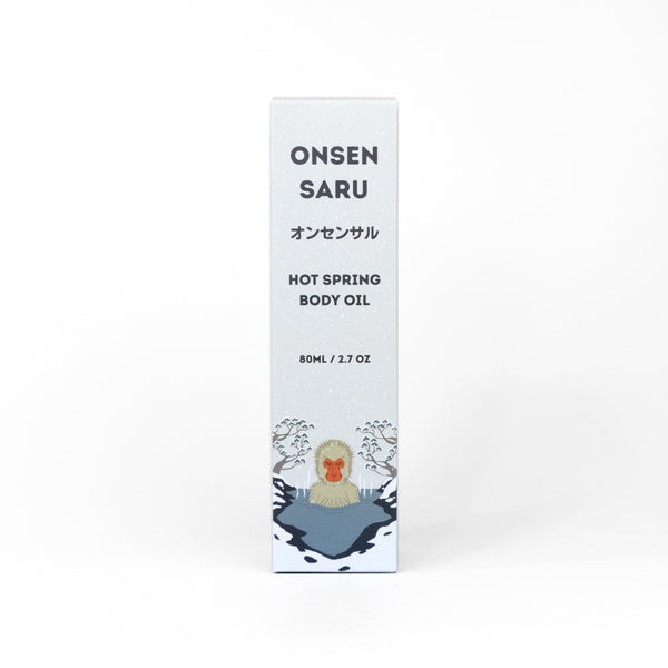 Onsen Saru hot spring body oil packaging on a white background
