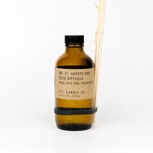 P.F. Candle Co. reed diffuser bottle with label on a white background