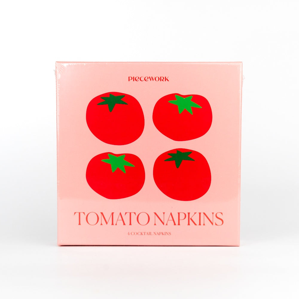 Pack of tomato-themed napkins with red tomatoes and green stems on a pink background.