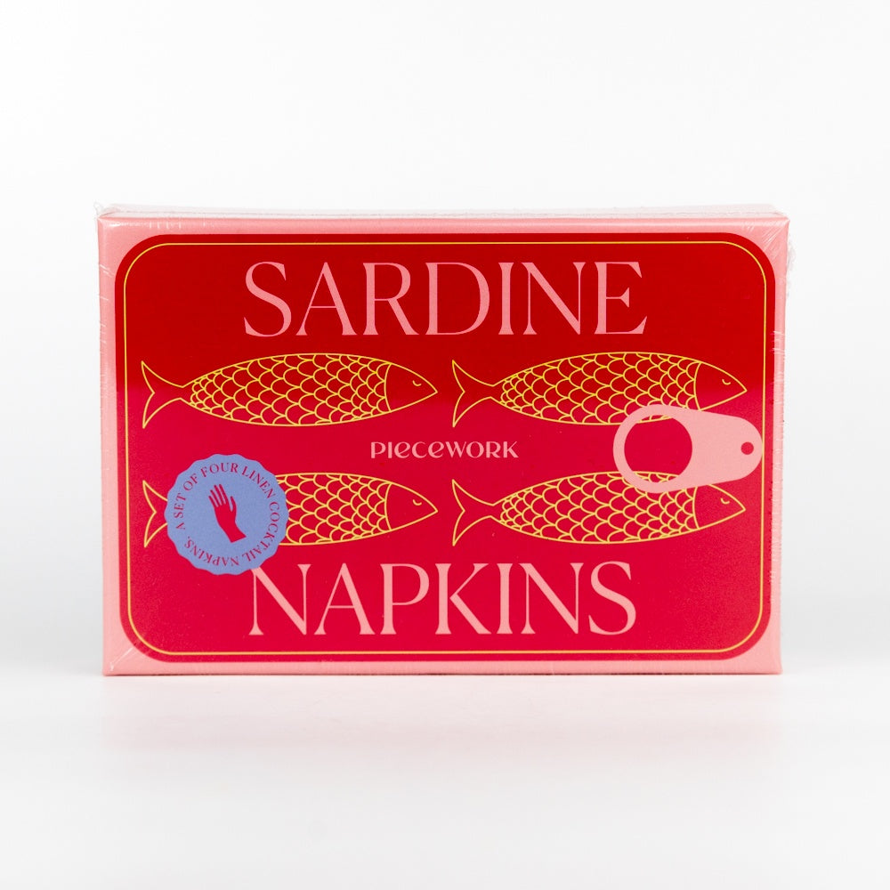 Red box of Sardine Napkins with fish illustrations on a white background