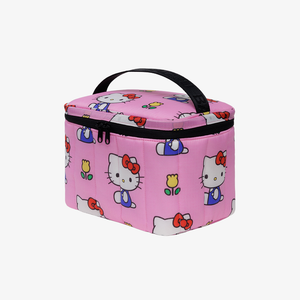 Pink piffy lunch bag with Hello Kitty designs on a white background
