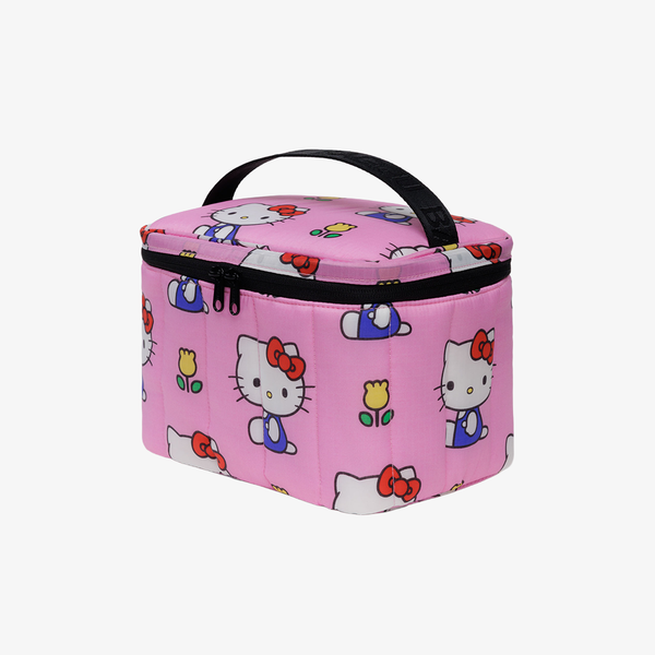 Pink piffy lunch bag with Hello Kitty designs on a white background