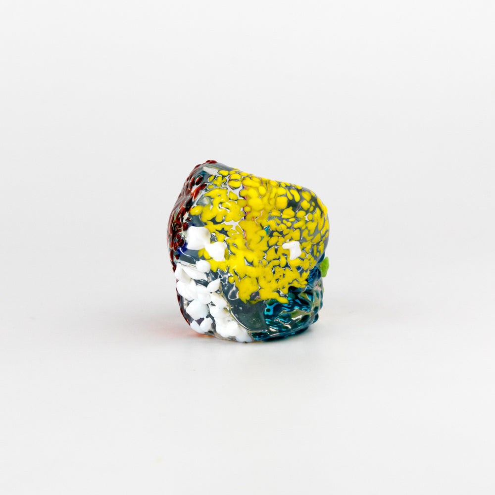 Colorful glass incense holder on a white background