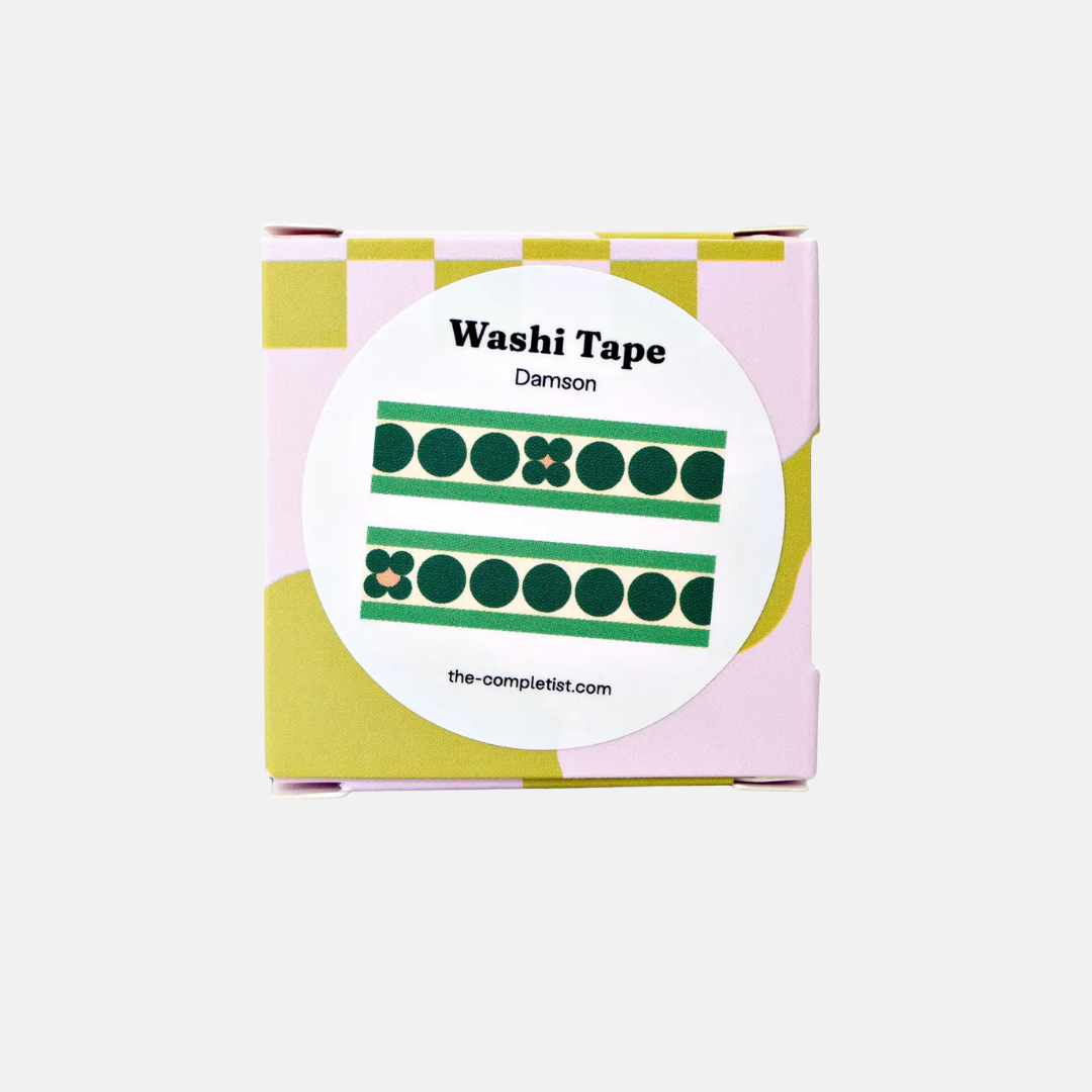 Washi tape packaging with a pink and yellow design on a white background