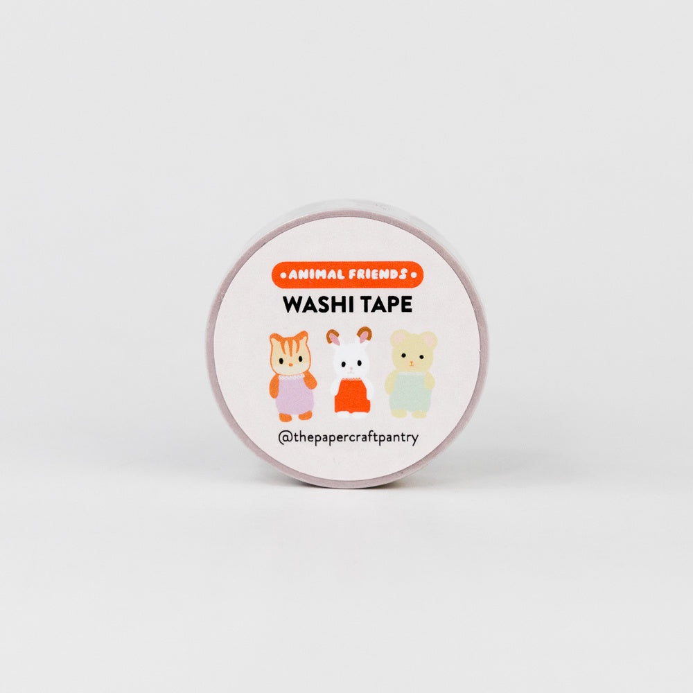 Washi tape with cartoon animal designs on a white background