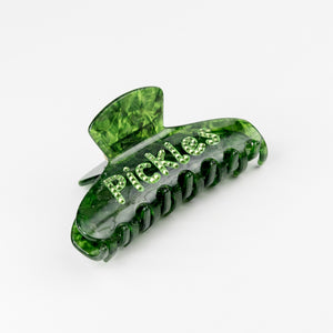 Green hair clip with 'Pickles' rhinestone text on a white background