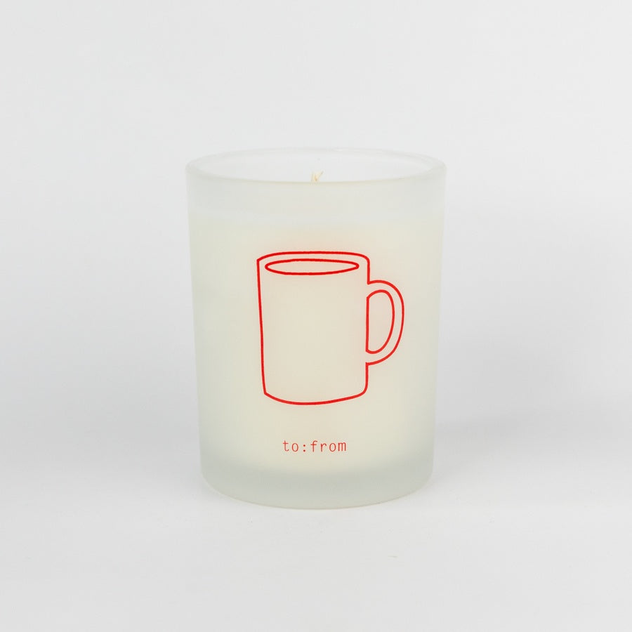 White candle with red mug outline and 'to:from' text on a white background