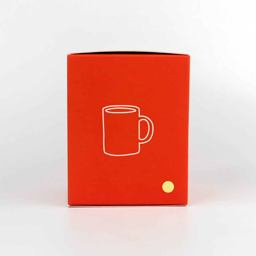 White candle with red mug outline and 'to:from' text on a white background