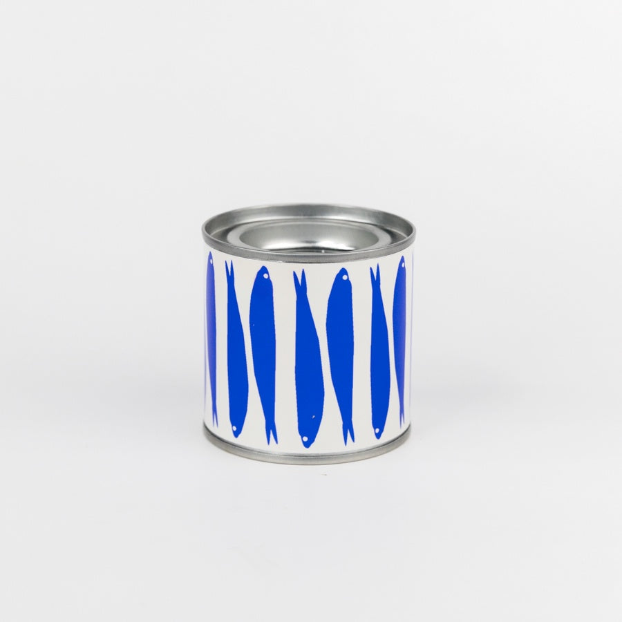 Can with blue fish illustrations on a white background