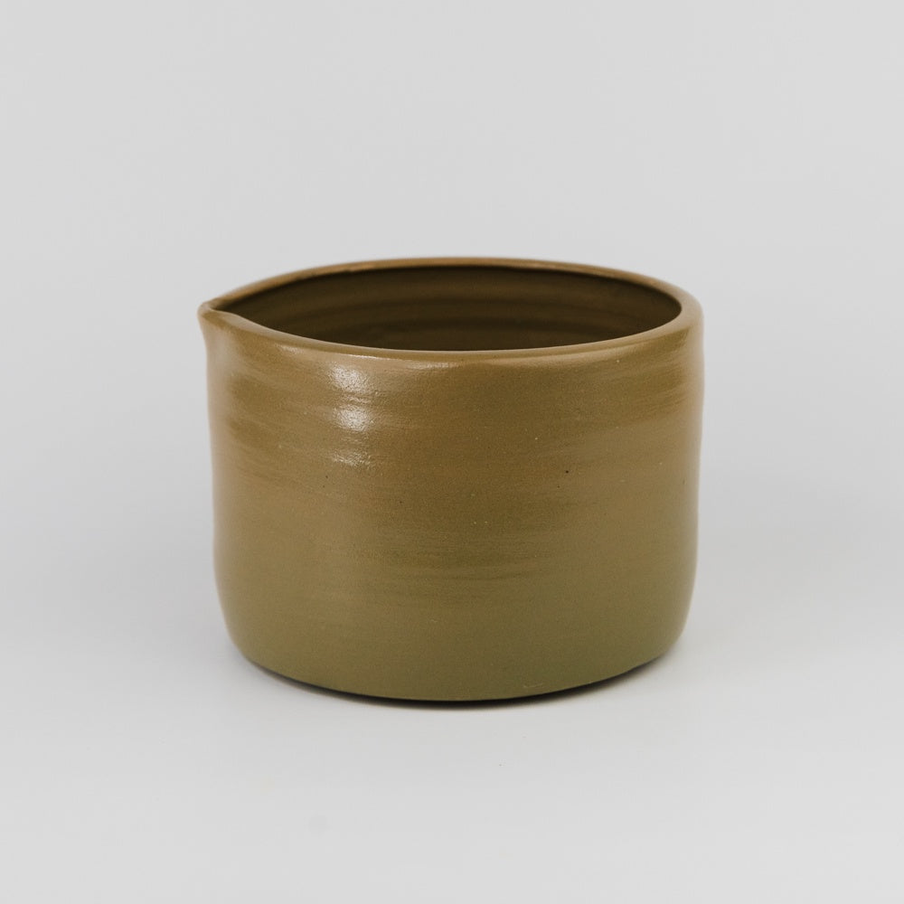 Brown ceramic pot on a white background