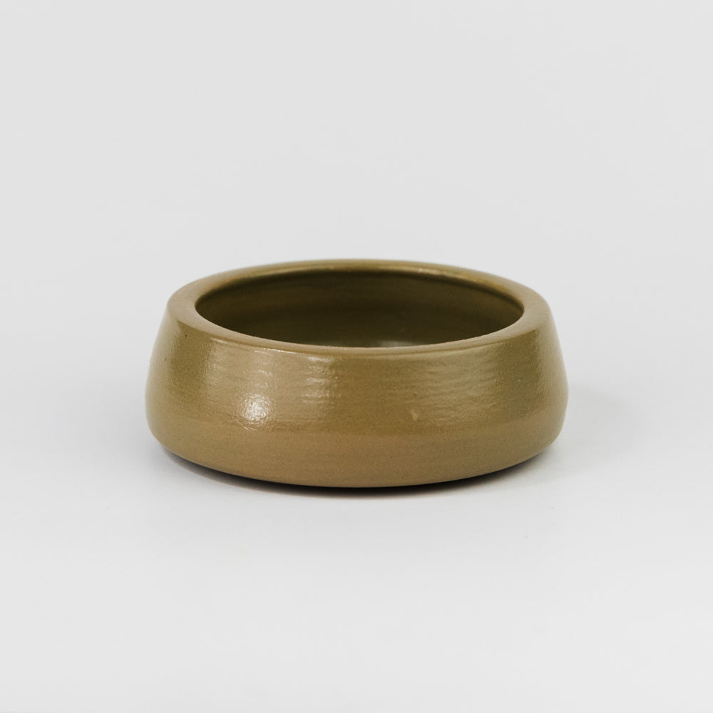 Brown ceramic bowl on a white background