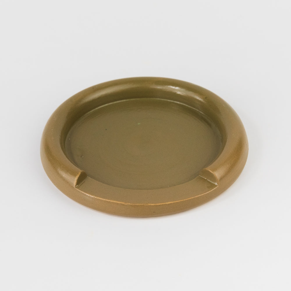 Brown ceramic dish on a white background