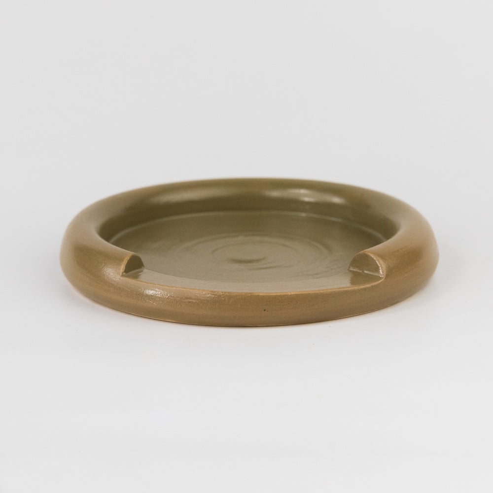 Brown ceramic dish on a white background