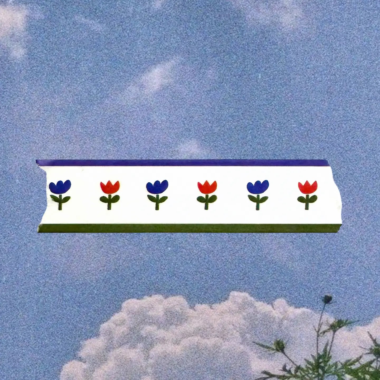 Decorative strip with floral pattern against a blue sky background
