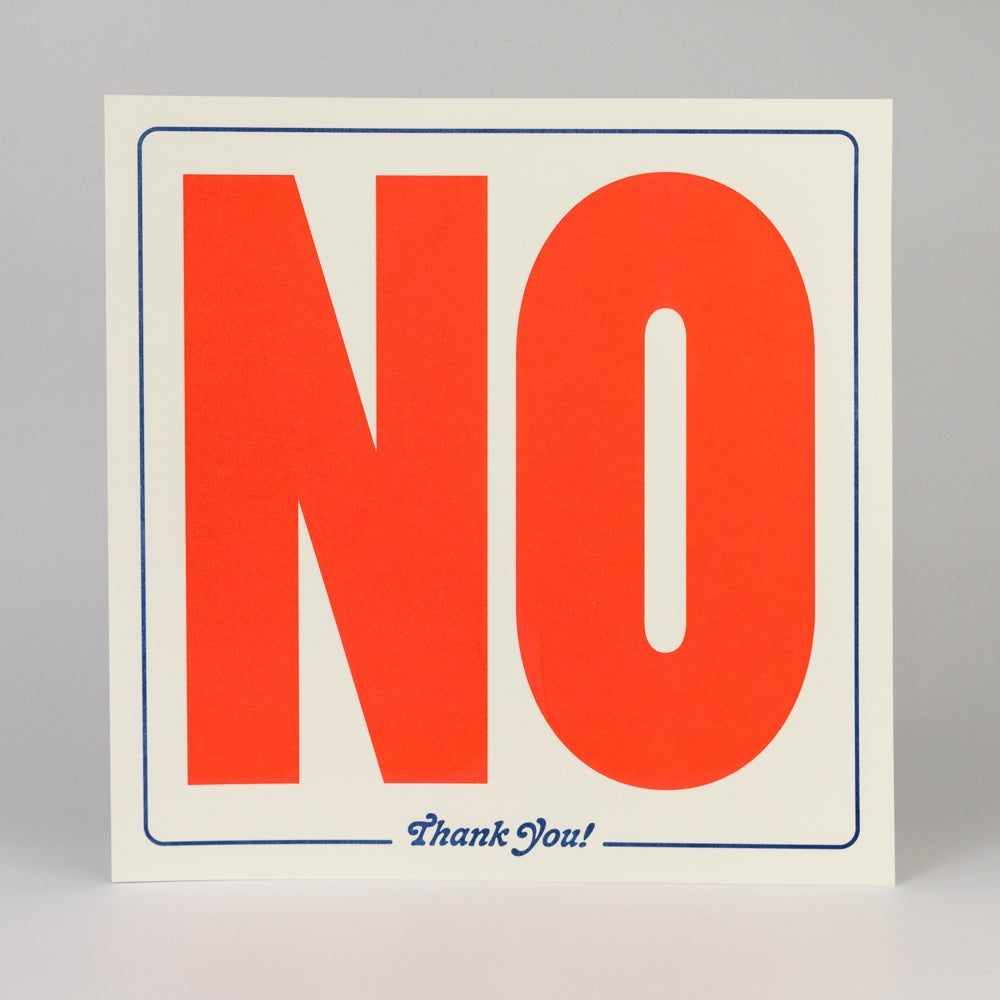 Print with large red 'NO' text on a gray background