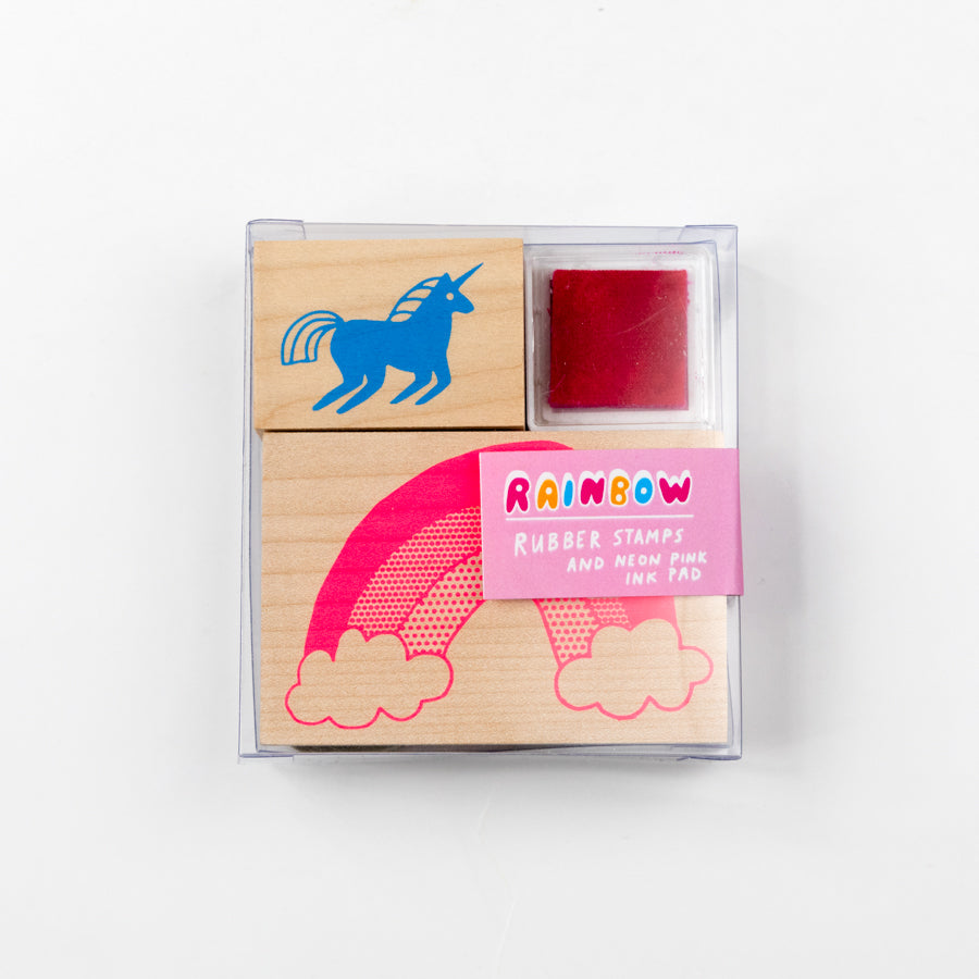 Rubber stamp set with a unicorn design and red ink pad in packaging on a white background